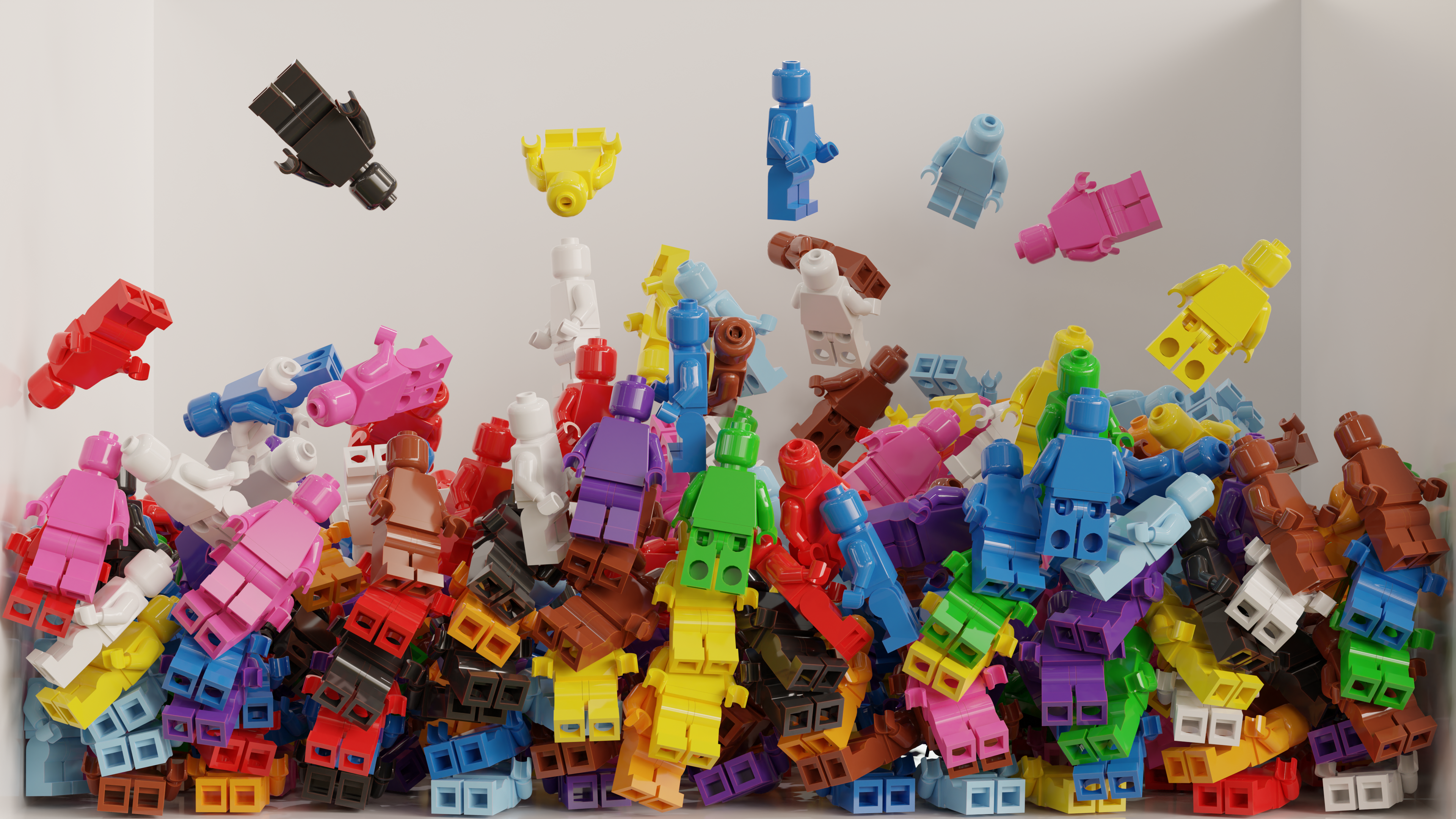 A bunch of rianbow lego figures falling into a white tub